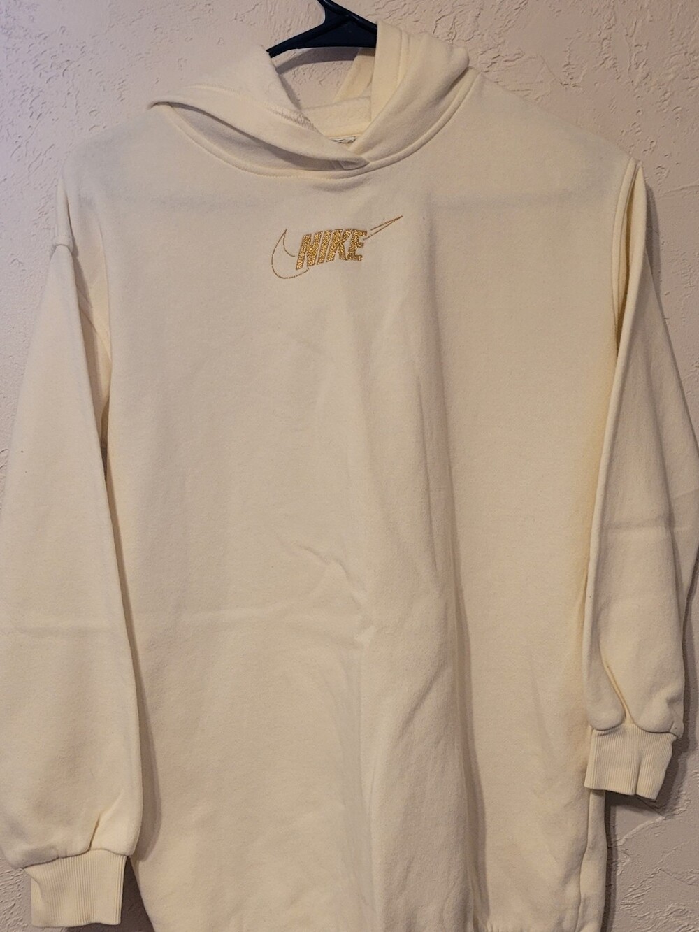 Kids medium Nike cream colored long/oversized hoodie